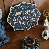 Don't Speak Latin in Front of the Books Sign