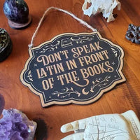 Don't Speak Latin in Front of the Books Sign